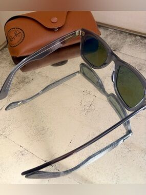 Ray-Ban Clear Gray Frame Sunglasses with blue mirror lenses